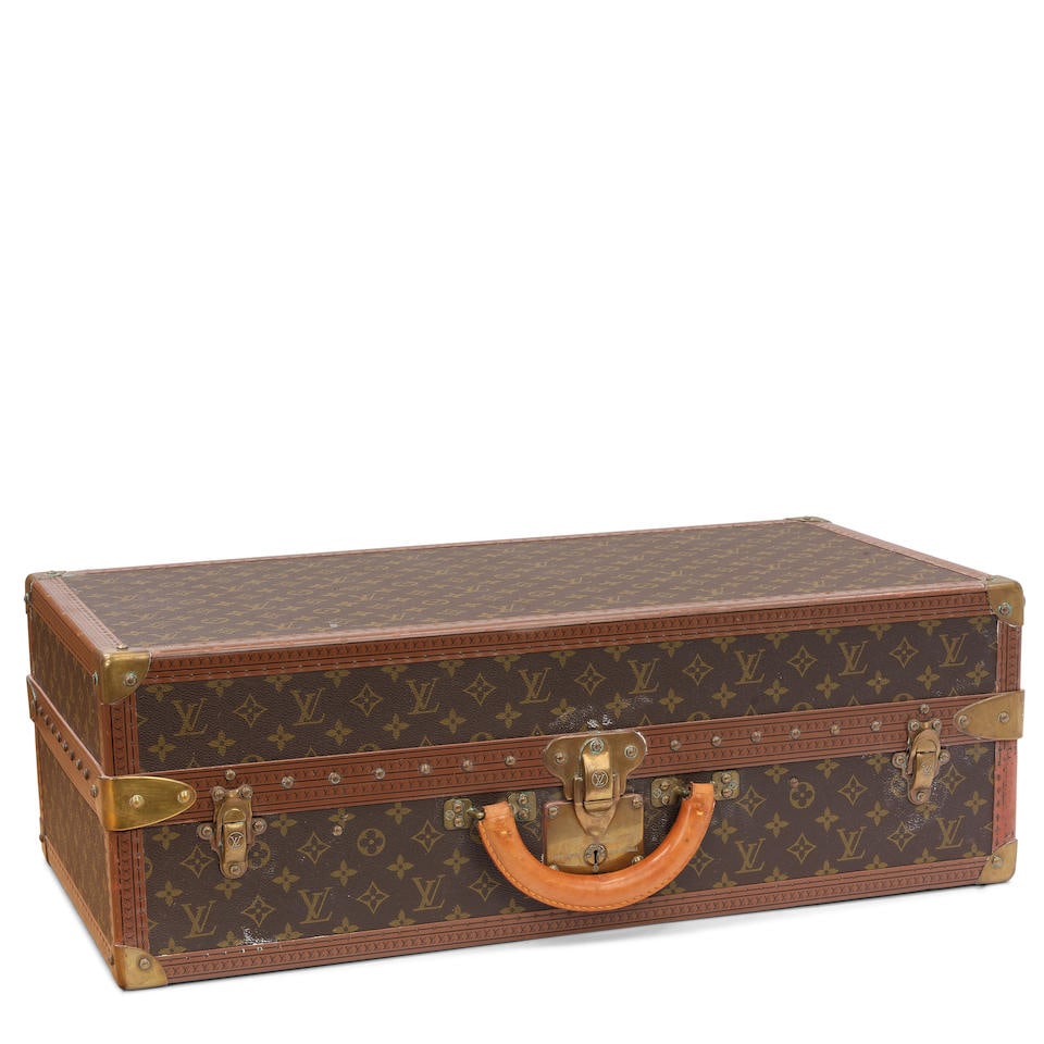 A LOUIS VUITTON MONOGRAM CANVAS SUITCASE (1 of 9)