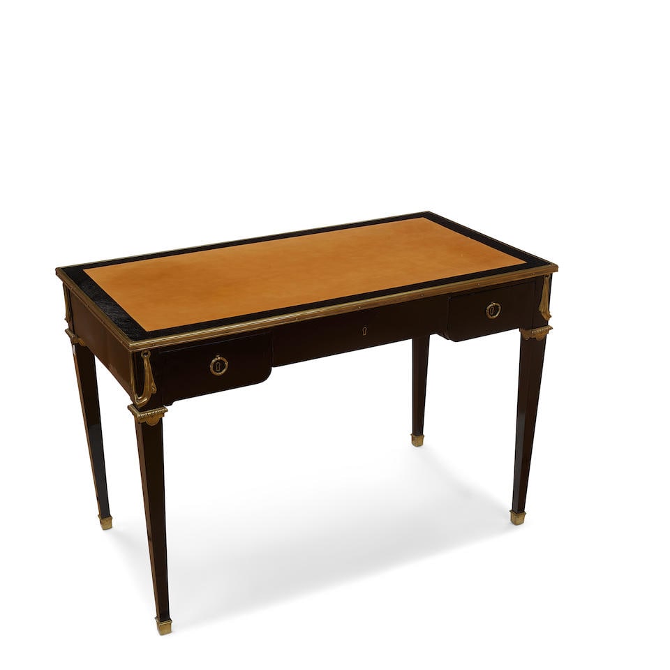 A LOUIS XVI STYLE LEATHER INSET BRASS MOUNTED EBONIZED BUREAU PLAT (1 of 3)