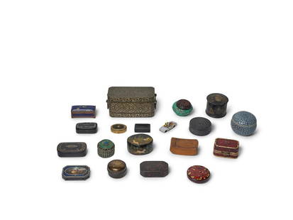 A GROUP OF EIGHTEEN TABLE BOXES AND A SMALL CAR19th and 20th century: A GROUP OF EIGHTEEN TABLE BOXES AND A SMALL CAR 19th and 20th century Including metal, porcelain, and lacquered examples. largest box height 3 1/2 in (9 cm); width 7 1/4 in (18 cm); depth 3 1/2 in (9