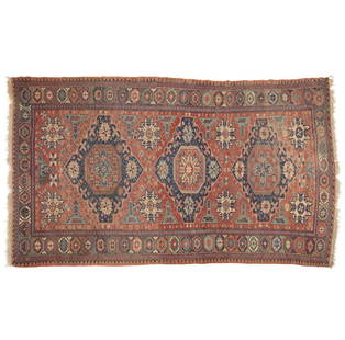 A SUMAK CARPET dimensions approximately 11 ft x 6 ft 10 in (3.4 m x 2.1 m): A SUMAK CARPET Late 19th century, Caucasus dimensions approximately 11ft x 6ft 10in (3.4m x 2.1m) Footnotes: Condition reports are not provided in catalog descriptions. The absence of a condition repo