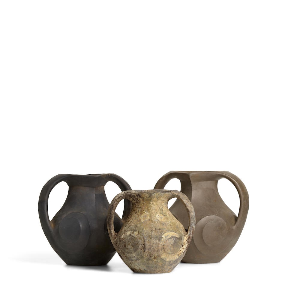 THREE SMALL SICHUAN BURNISHED POTTERY AMPHORAS Han Dynasty (3): THREE SMALL SICHUAN BURNISHED POTTERY AMPHORAS Han Dynasty the tallest 6 5/8in (16.8cm) high (3). Footnotes: 漢 四川雙耳小陶罐三件 Provenanc
