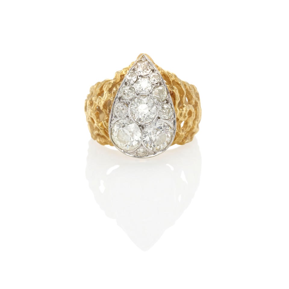 A BI-COLOR GOLD AND DIAMOND RING (1 of 3)