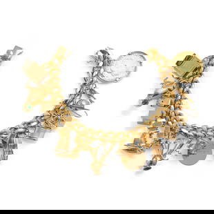 A GOLD CHARM BRACELET: A GOLD CHARM BRACELET A curb link chain bracelet, with charms of 9k, 10k, 12k, 14k and 18k gold of various designs, also including an 1884 Queen Victoria 'Young Head' 22k gold Sovereign coin charm,  l