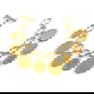 ELIZABETH LOCKE: A GOLD COIN BRACELET: ELIZABETH LOCKE: A GOLD COIN BRACELET Featuring gold United States of America $1 and $10 coins, various gold Mexican pesos, a gold Canadian $5 coin, and a gold Belgian 20 franc coin, each in gold fram