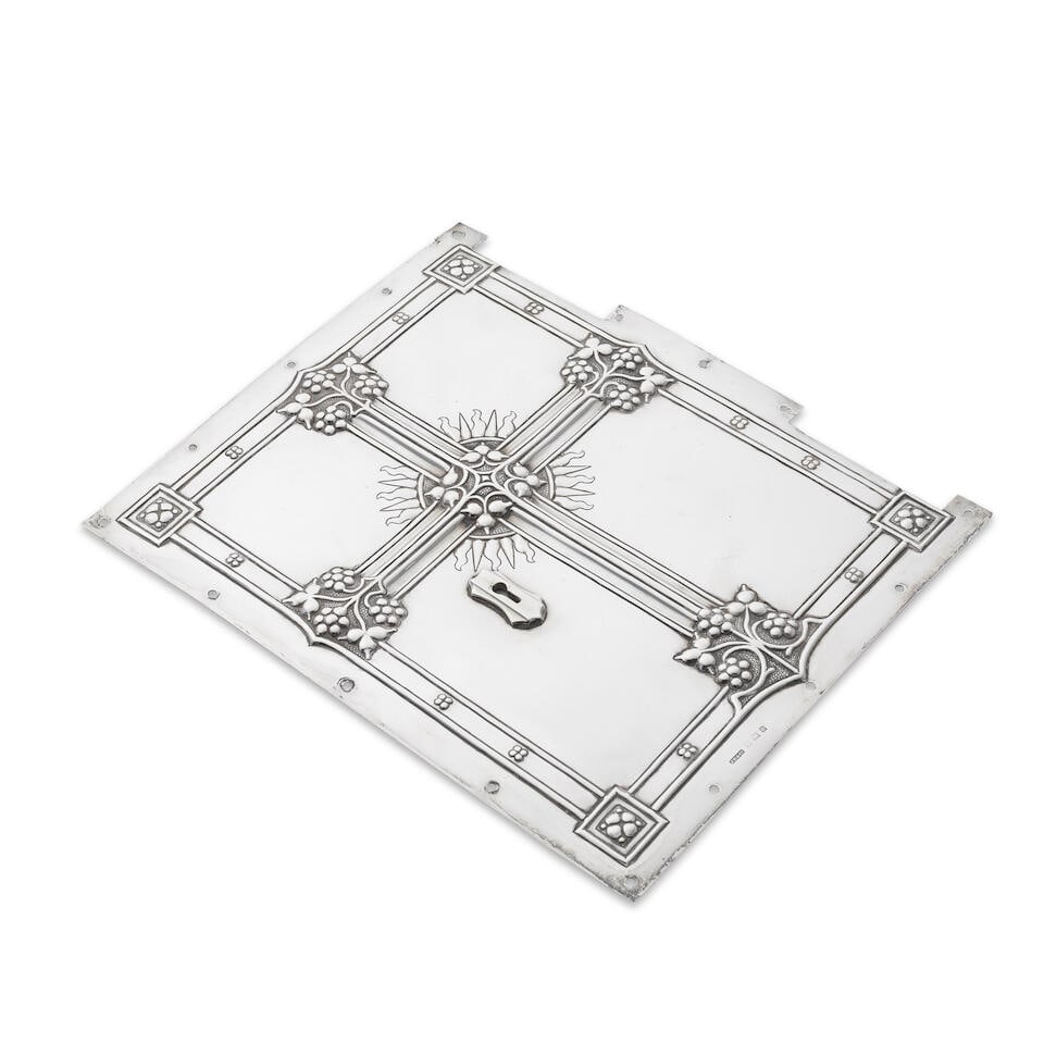 A silver bible or book cover John Hardman & Co, Birmingham 1924: A silver bible or book cover John Hardman & Co, Birmingham 1924 In the Gothic Revival manner, with ribbed cross to the centre with floral motifs to the terminals and centred on a floral motif, with e