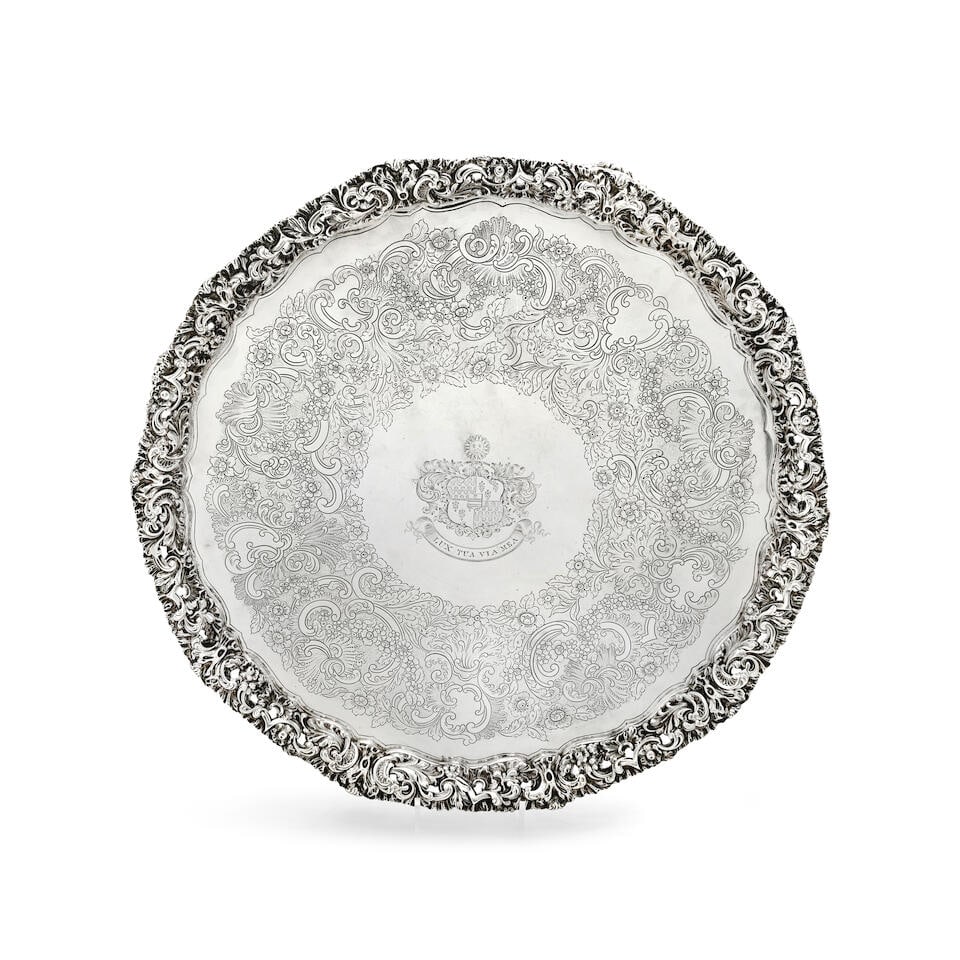 An impressive William IV large silver salver Robert Gainsford, Sheffield 1830: An impressive William IV large silver salver Robert Gainsford, Sheffield 1830 Circular form, with cast and pierced foliate border, the centre with engraved foliate scrolling and C-scrolls, centred wi