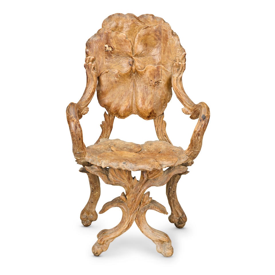 An Italian late 19th/early 20th century 'Art Nouveau' carved pine grotto armchair 1895-1915 (1 of 4)