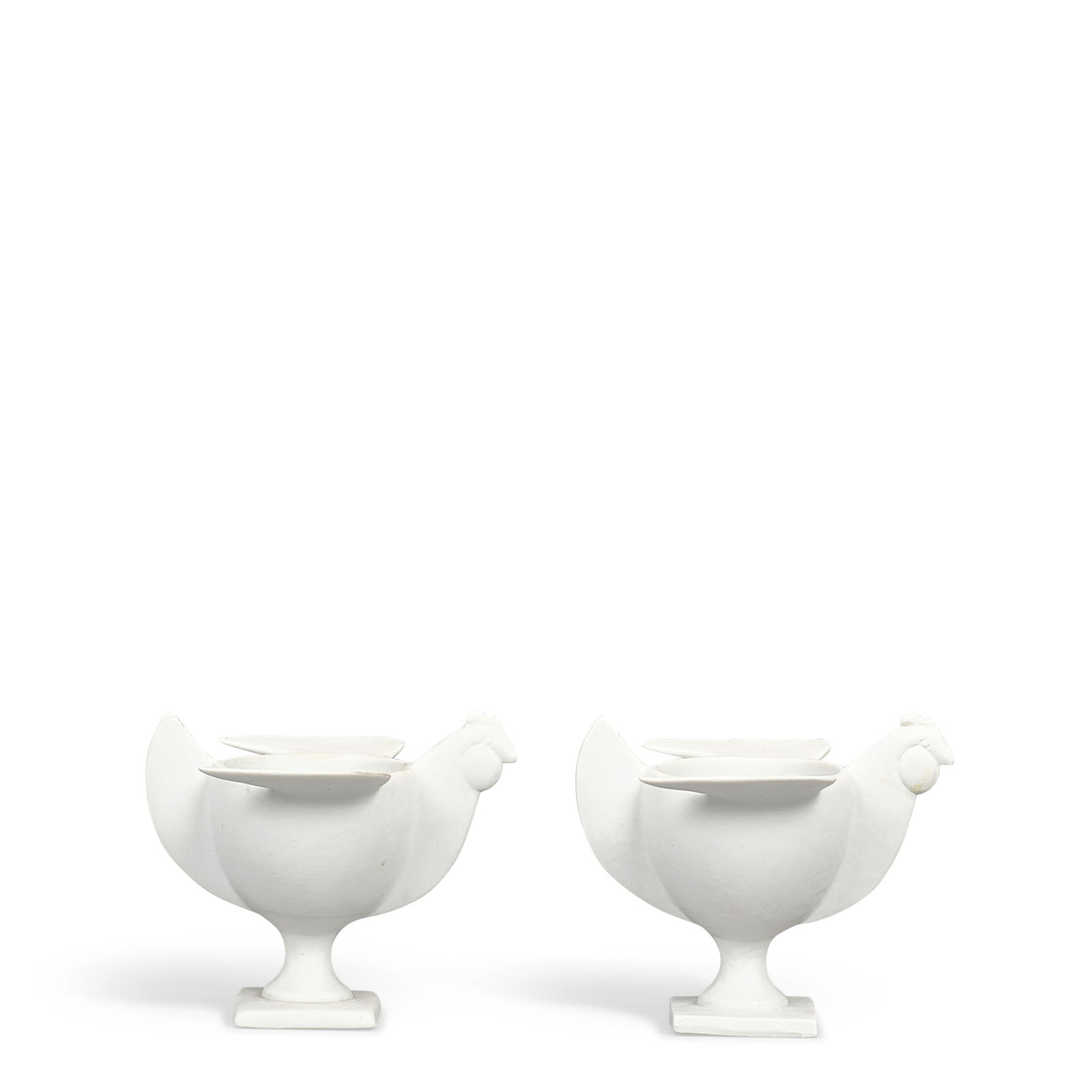 FRANÇOIS-XAVIER LALANNE (1927-2008) Pair of Le Coquetier (Egg Holders)circa 1990porcelain, ...: FRANÇOIS-XAVIER LALANNE (1927-2008) Pair of Le Coquetier (Egg Holders) circa 1990 porcelain, signed 'LALANNE FRANCE' with Porcelain de Paris mark on underside of base height of each 2 3/4in (7cm)