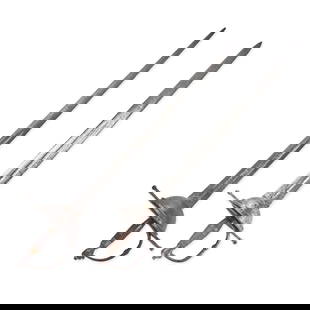 TWO SPANISH/PORTUGUESE CUP HILT BROADSWORDS.: TWO SPANISH/PORTUGUESE CUP HILT BROADSWORDS. late 17th/early 18th century. The hilts with forged iron cross guards and knuckle bows, deep cup guards, faceted pommels, turned horn and wood grips and st