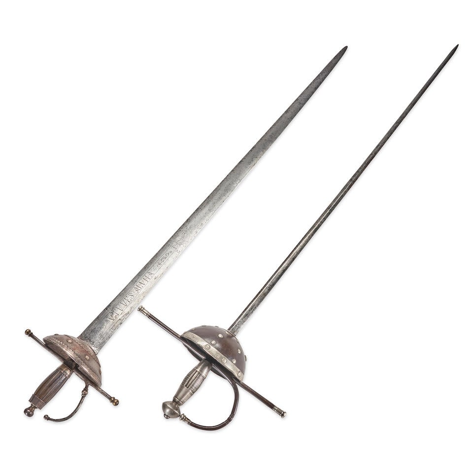 TWO SILVER ADORNED SPANISH/PORTUGUESE CUP HILT SWORDS,: TWO SILVER ADORNED SPANISH/PORTUGUESE CUP HILT SWORDS, 18th century. A rapier with forged iron cross guard and knuckle bow with silver quillon caps, deep cup guard with silver edging and rivets, silve