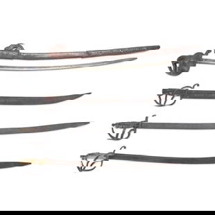 FOUR 19TH CENTURY SPANISH COLONIAL CAVALRY SABERS.: FOUR 19TH CENTURY SPANISH COLONIAL CAVALRY SABERS. With iron hilts, bone, wood, or horn grips and curved single-edge blades. Overall lg. to 35 1/2 in. For further information on this lot please visit