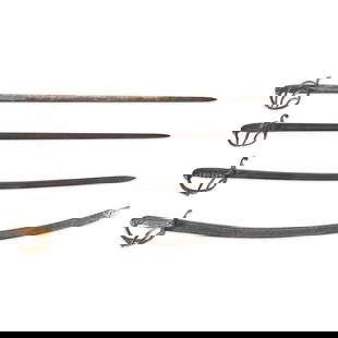 FOUR 19TH CENTURY SPANISH/EUROPEAN CAVALRY SABERS.: FOUR 19TH CENTURY SPANISH/EUROPEAN CAVALRY SABERS. Two with brass hilts, two with iron hilts; straight and curved blades. Overall lg. to 42 3/4 in. For further information on this lot please visit Bon