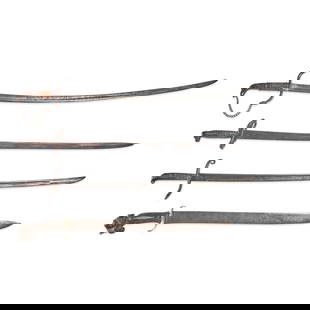 FOUR SPANISH/MEXICAN SWORDS,: FOUR SPANISH/MEXICAN SWORDS, 19th century. A sword with an iron hilt featuring an eagle pommel and wood grip mounted on a curved single-edge blade; two swords with silver inlaid iron grips and slightl