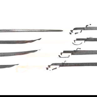 FOUR SPANISH COLONIAL ESPADAS ANCHAS-TYPE SWORDS.: FOUR SPANISH COLONIAL ESPADAS ANCHAS-TYPE SWORDS. 18th/19th century. With iron and horn grips on straight or curved blades. Overall lg. to 38 in. For further information on this lot please visit Bonha
