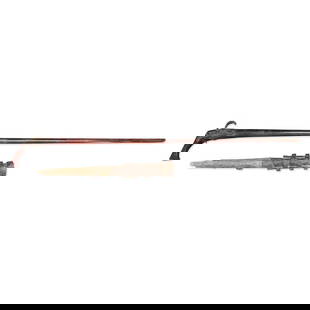 AN ASIAN HAND CANNON AND A CHINESE MATCHLOCK MUSKET.: AN ASIAN HAND CANNON AND A CHINESE MATCHLOCK MUSKET. The hand cannon with three forged barrels and remnants of a pole; the musket with 48 1/2 in. .36 caliber octagon to round barrel and hard wood pist