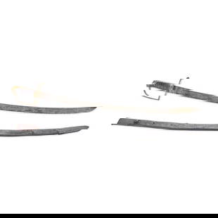 A LATE 18TH CENTURY CAVALRY SABER.: A LATE 18TH CENTURY CAVALRY SABER. The brass hilt with narrow counter-guard and knuckle bow connecting to a pommel cap with back strap, carved wood grip; straight single-edge blade with a false edge a