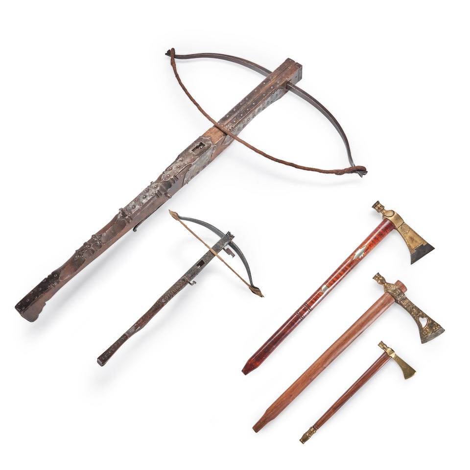 THREE REPRODUCTION PIPE TOMAHAWKS AND TWO REPRODUCTION CROSSBOWS. (1 of 1)