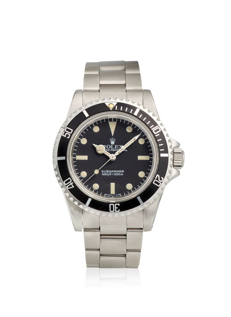 ROLEX. A STAINLESS STEEL AUTOMATIC BRACELET WATCH Submariner , Ref: 5513, c. 1984 (1 of 2)
