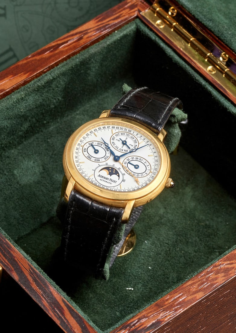 AUDEMARS PIGUET. AN 18K GOLD AUTOMATIC PERPETUAL CALENDAR WRISTWATCH Millenary Quantième Pe... (1 of 6)