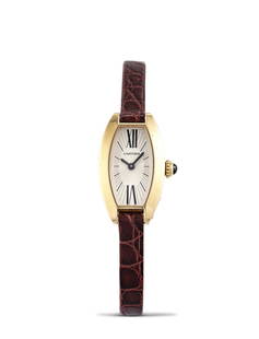 CARTIER | MINI TONNEAU, REF.2592, A YELLOW GOLD WRISTWATCH, CIRCA 2020: CARTIER | MINI TONNEAU, REF.2592, A YELLOW GOLD WRISTWATCH, CIRCA 2020 Case No: 45059CE Calibre: Quartz, signed Dial: Silvered, signed Case: 16 x 27mm (including lugs), 18k yellow gold, screwed case b