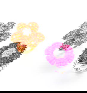TWO GEM-SET AND DIAMOND 'FLOWER' RINGS: TWO GEM-SET AND DIAMOND 'FLOWER' RINGS &#24425;&#33394;&#23542;&#30707;&#37197;&#38013;&#30707;&#25106;&#25351;&#20841;&#26522; Metal: 18 karat white and yellow gold Ring sizes: 4 Gross weight: ruby 8