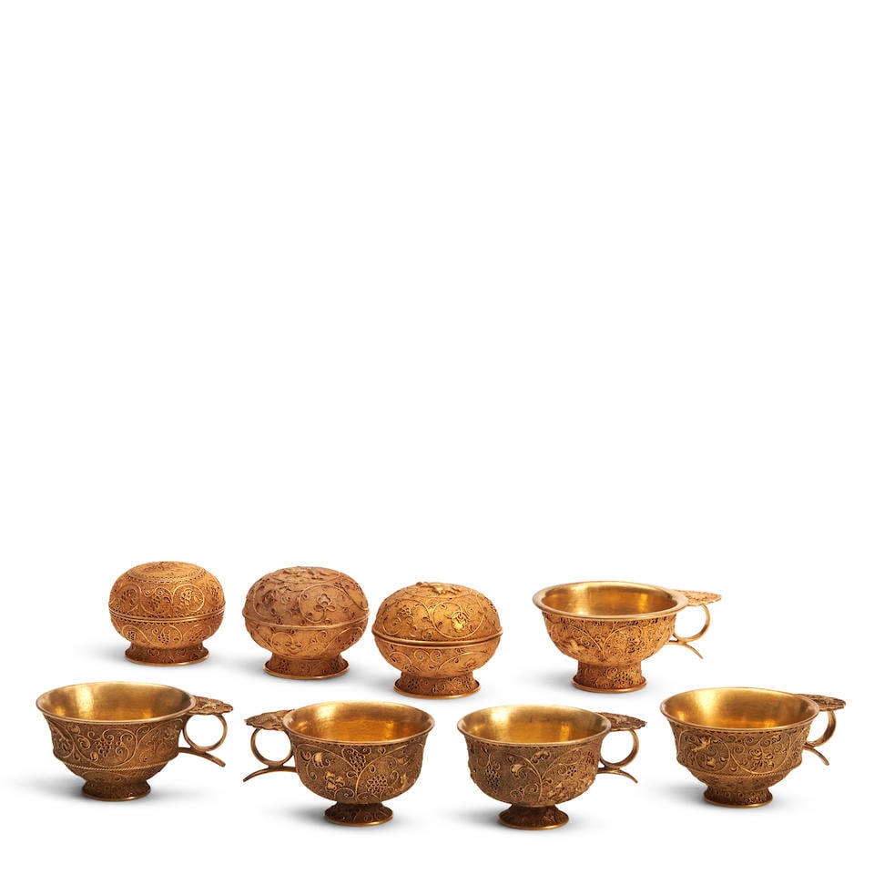 A GROUP OF EIGHT CHINESE CONTEMPORARY METAL DECORATIVE BOXES AND CUPS (8): A GROUP OF EIGHT CHINESE CONTEMPORARY METAL DECORATIVE BOXES AND CUPS 2 1/2in (6.4cm) to 3 3/4in (9.5cm) width (8). Footnotes: OVERALL CONDITION: Surface grime; some surface wear. This condition repor