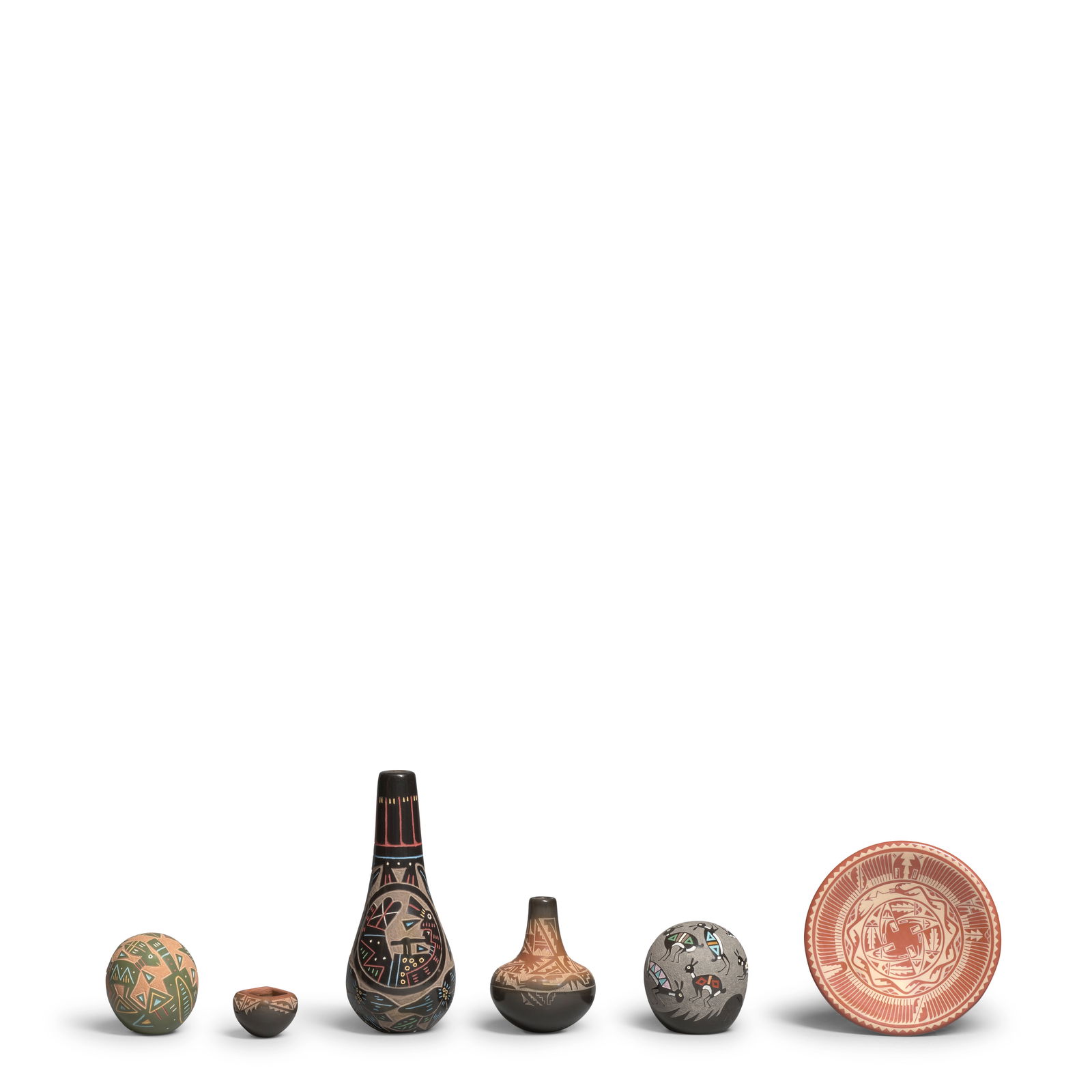 Six miniature Santa Clara Pueblo pottery objects (1 of 1)