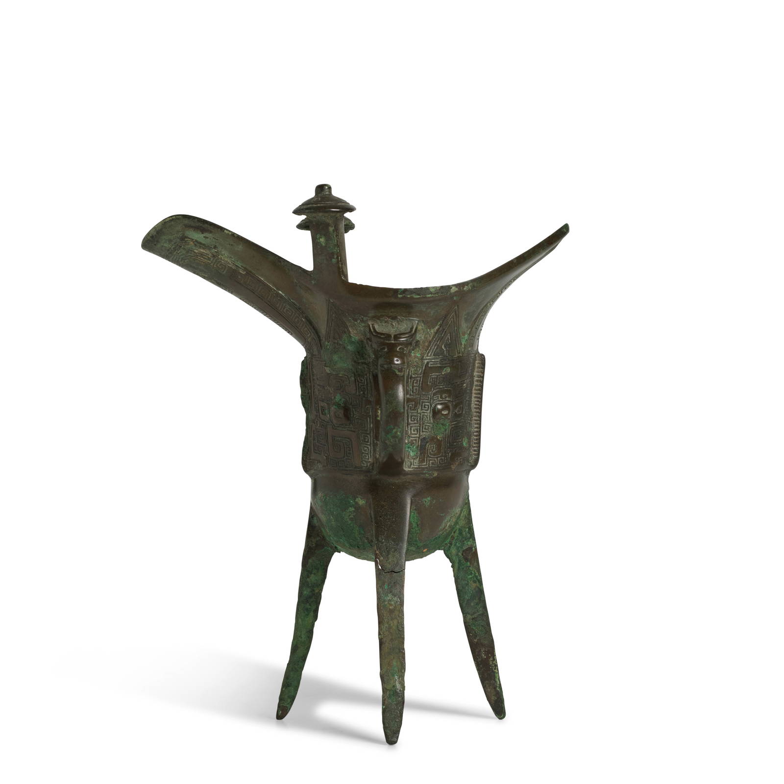 AN ARCHAIC BRONZE RITUAL TRIPOD WINE VESSEL, JUE Late Shang Dynasty