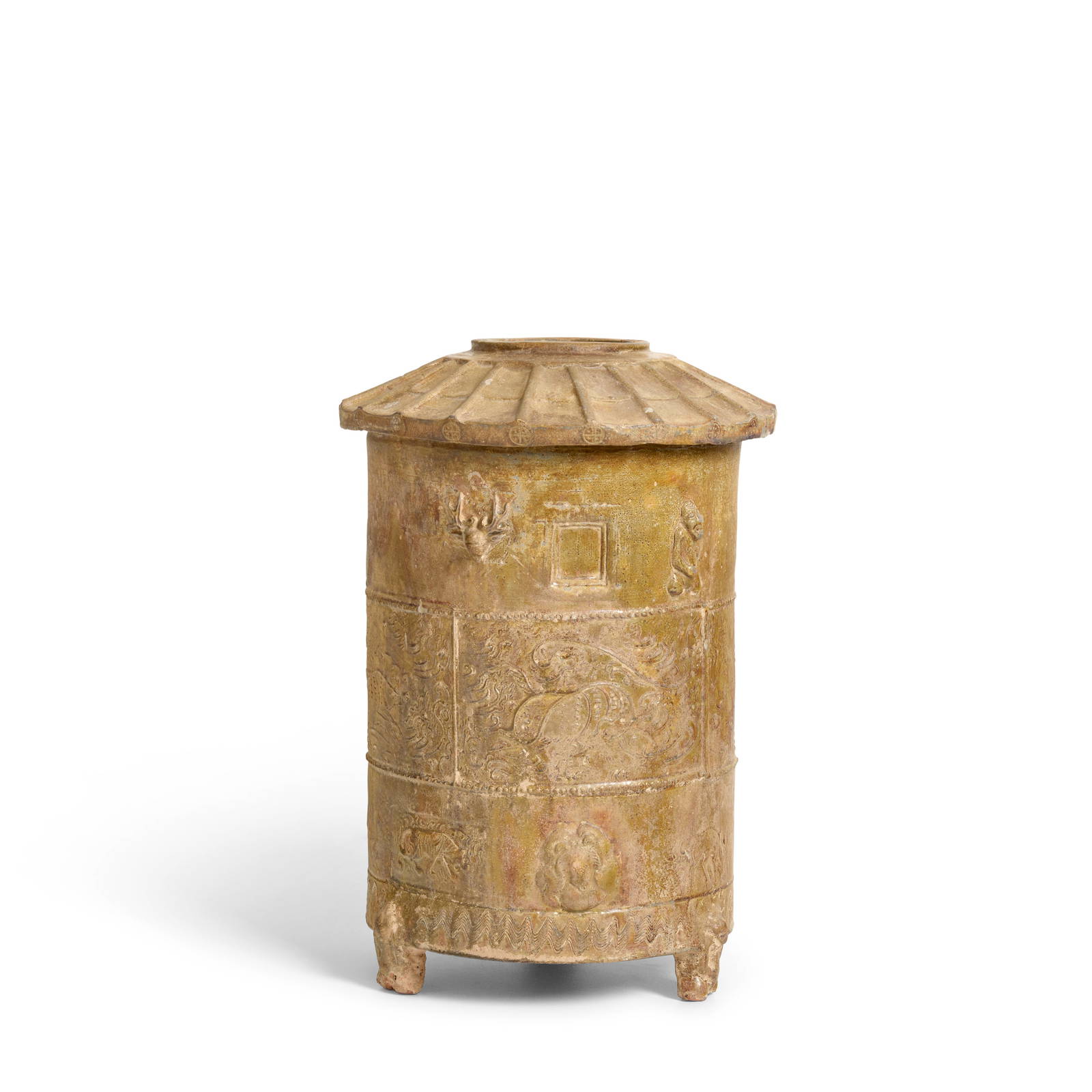 A GREEN-GLAZED TRIPOD GRANARY JAR Han Dynasty