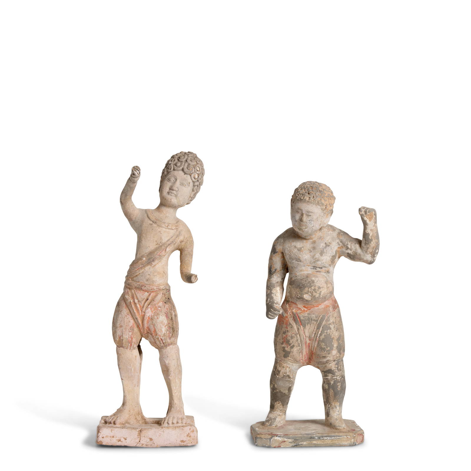 TWO PAINTED POTTERY FIGURES OF 'FOREIGN' BOYS Tang Dynasty (2)