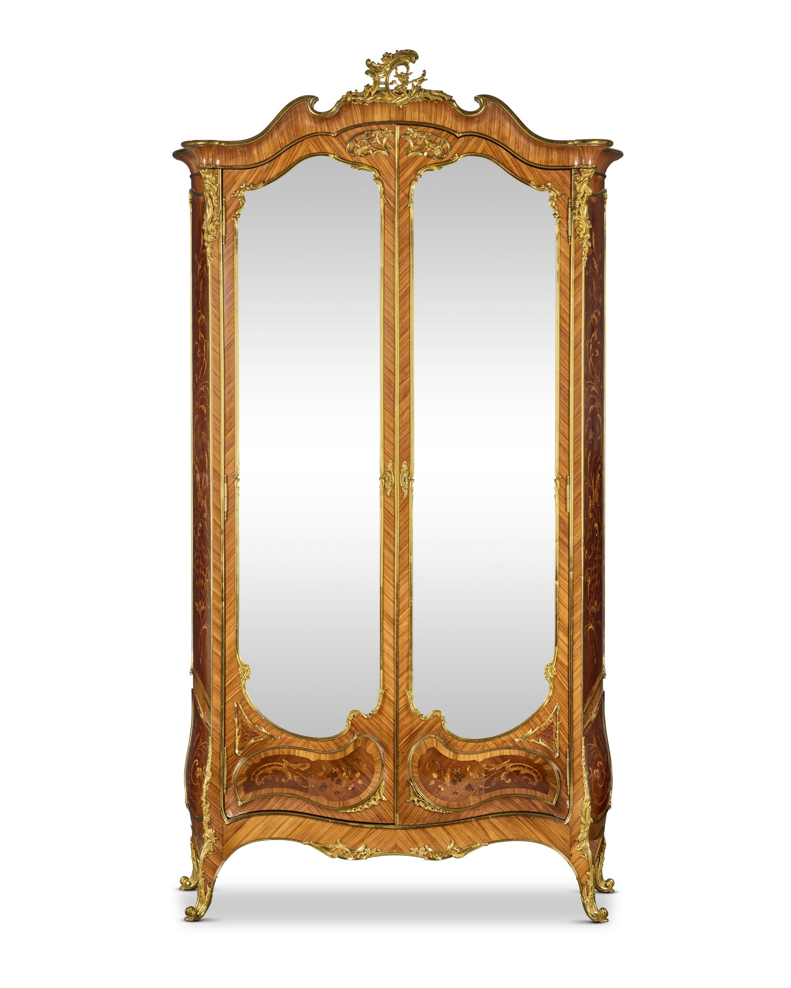 A French late 19th century kingwood, rosewood, marquetry and gilt bronze mounted bombé armo...: A French late 19th century kingwood, rosewood, marquetry and gilt bronze mounted bombé armoire In the Louis XV style, attributed to Joseph-Emmanuel Zwiener (1848-1895) The shaped ogee moulded cor