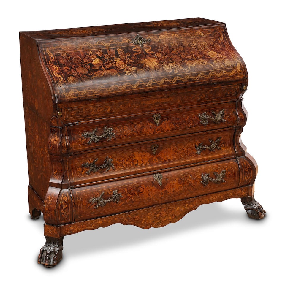 A DUTCH PATINATED BRONZE MOUNTED MARQUETRY INLAID WALNUT DESKLate 18th century: A DUTCH PATINATED BRONZE MOUNTED MARQUETRY INLAID WALNUT DESK Late 18th century height 43in (109cm); width 44 3/4in (113.6cm); depth 21in (53.3cm) Footnotes: Provenance Bonhams, Los Angeles, European