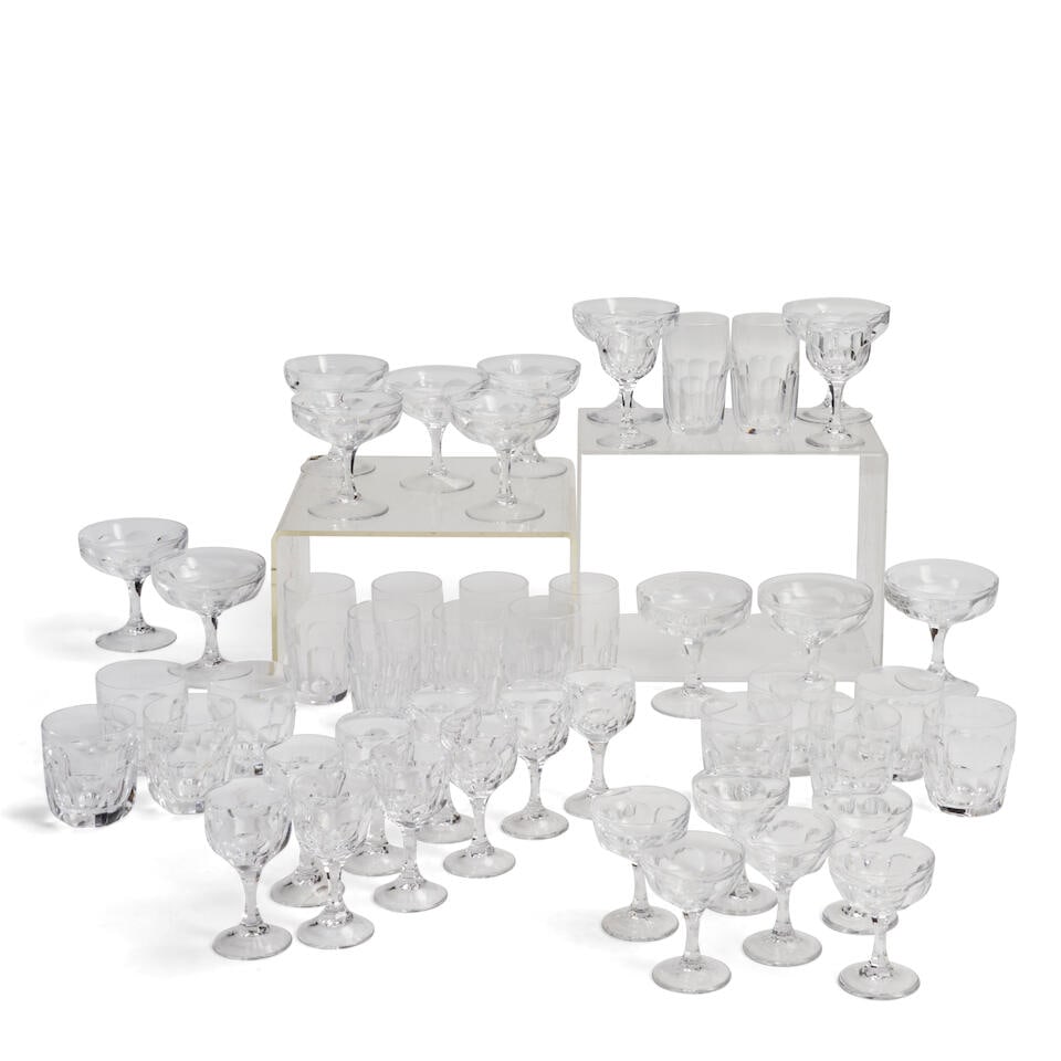 A LARGE GROUP OF PEILL & PUTZLER GLASSWARE: A LARGE GROUP OF PEILL & PUTZLER GLASSWARE Comprising eleven champagne coupes, ht. 4 5/8, dia. 4 3/8, Six small champagne coupes, ht. 4, dia. 3, eleven goblets, ht. 4 7/8, dia. 2 1/2, nine tall tumble