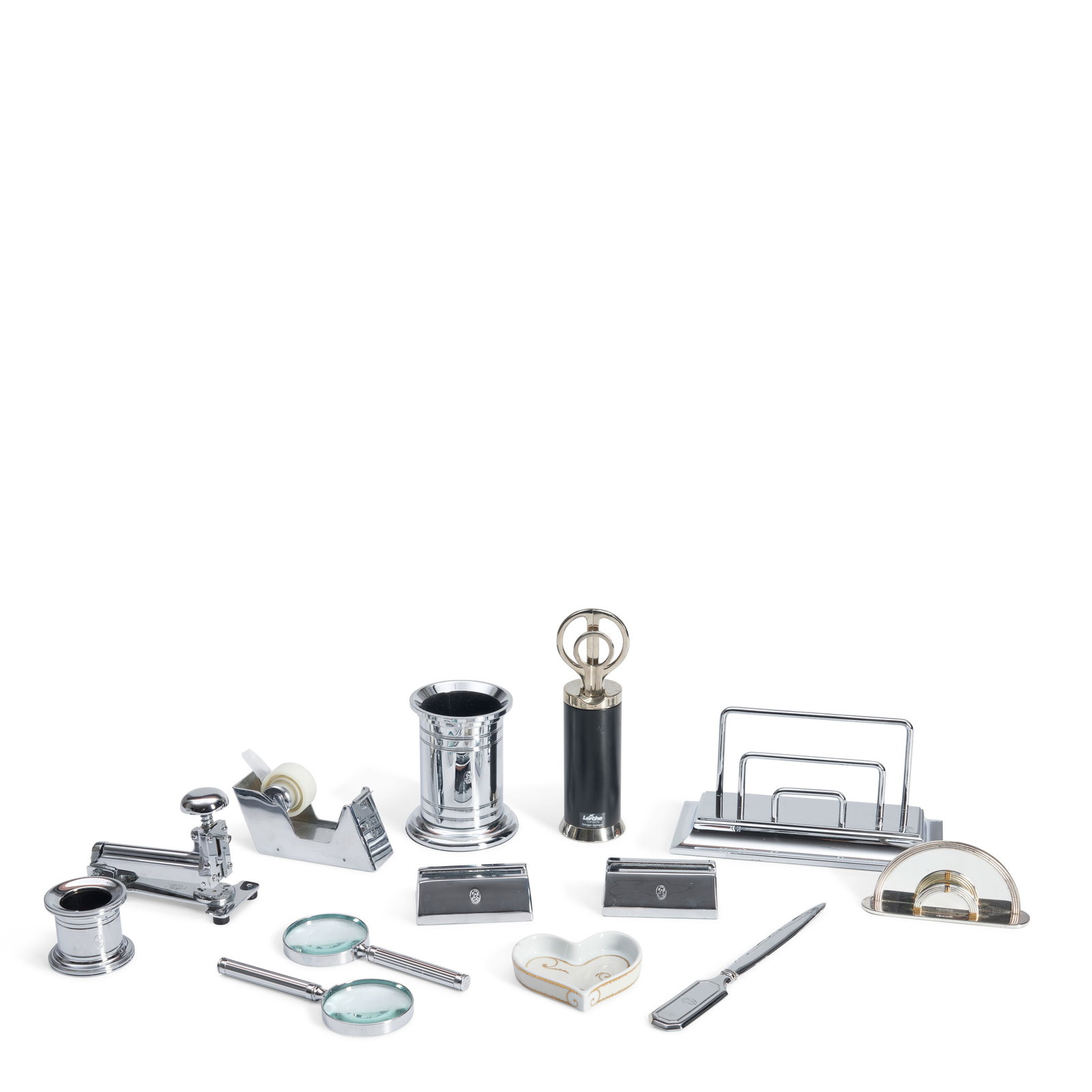 COLLECTION OF DESK ACCESSORIES: COLLECTION OF DESK ACCESSORIES Late 20th/early 21st century, comprising two El Casco magnifying glasses, lg. 6 1/8, El Casco letter opener, lg. 8 1/2, El Casco pencil pot, ht. 4 3/4, El Casco two desk