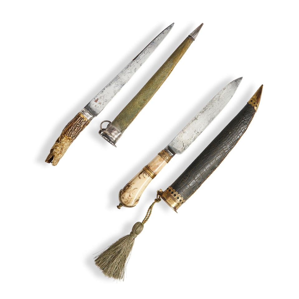 TWO 18TH/19TH CENTURY EUROPEAN HUNTING DAGGERS.: TWO 18TH/19TH CENTURY EUROPEAN HUNTING DAGGERS. A dagger with a two section polished bone grip and rounded brass pommel cap; straight single-edge blade; black leather scabbard with brass throat and ti