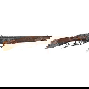 A MATCHLOCK ESPIGNOLE WITH INSCRIPTION REFERENCING CHRISTOPHER COLUMBUS AND ICONOGRAPHY REPRESEN...: A MATCHLOCK ESPIGNOLE WITH INSCRIPTION REFERENCING CHRISTOPHER COLUMBUS AND ICONOGRAPHY REPRESENTING SPAIN. The 31 3/4 in., 1.19 caliber heavy octagon to round barrel octagonal at the breech with a