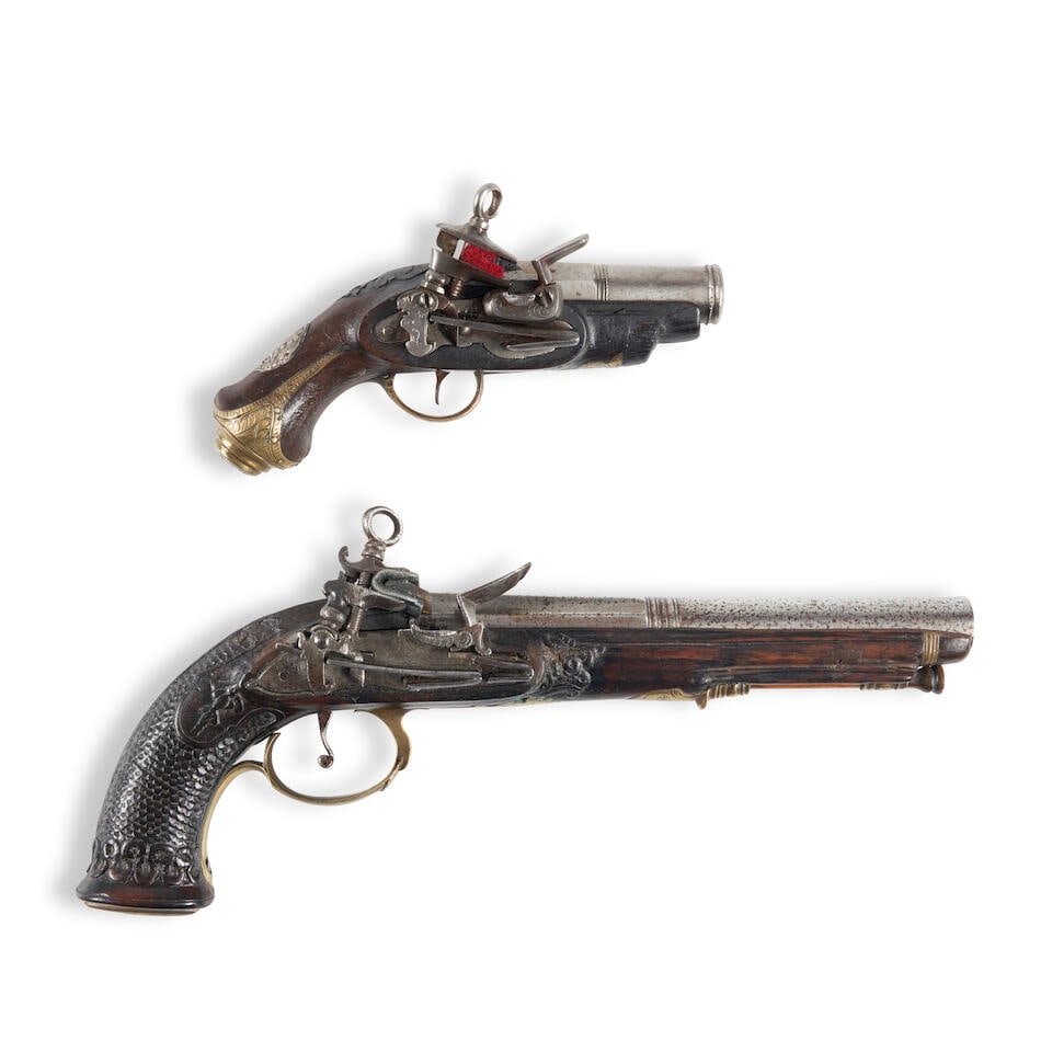 TWO SPANISH MIQUELET FLINTLOCK PISTOLS,: TWO SPANISH MIQUELET FLINTLOCK PISTOLS, late 18th/early 19th century. A pistol with a 7 3/4 in., .68 caliber barrel with Spanish maker's markings on the breech; miquelet lock; walnut stock with scale-