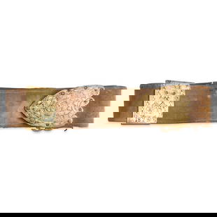 AN EARLY FRENCH MILITARY BELT,: AN EARLY FRENCH MILITARY BELT, 1828. The 3 1/2 in. wide leather belt with stitched edges mounted with a brass plate with embossed and punch decorated fleur-de-lys and geometric patterns and a