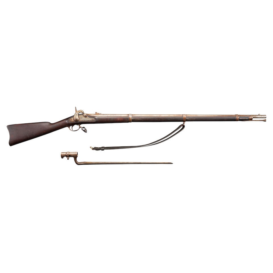 A CIVIL WAR MODEL 1861 RIFLE MUSKET BY THE NORWICH ARMS COMPANY WITH BAYONET,: A CIVIL WAR MODEL 1861 RIFLE MUSKET BY THE NORWICH ARMS COMPANY WITH BAYONET, Norwich, Connecticut, 1863. 40 in., .58 caliber rifled barrel with folding rear sight and marked with 'V', 'P' and eagle's