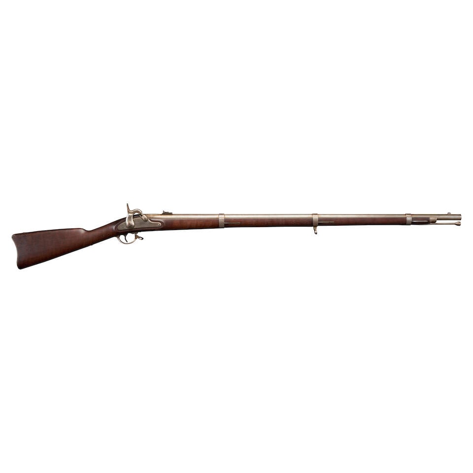 A CIVIL WAR BRIDESBURG U.S. MODEL 1861 RIFLE MUSKET,: A CIVIL WAR BRIDESBURG U.S. MODEL 1861 RIFLE MUSKET, 1862. 40 in., .58 caliber rifled barrel with two leaf rear sight, no visible proof marks at the breech; the lock plate marked with a spread wing ea