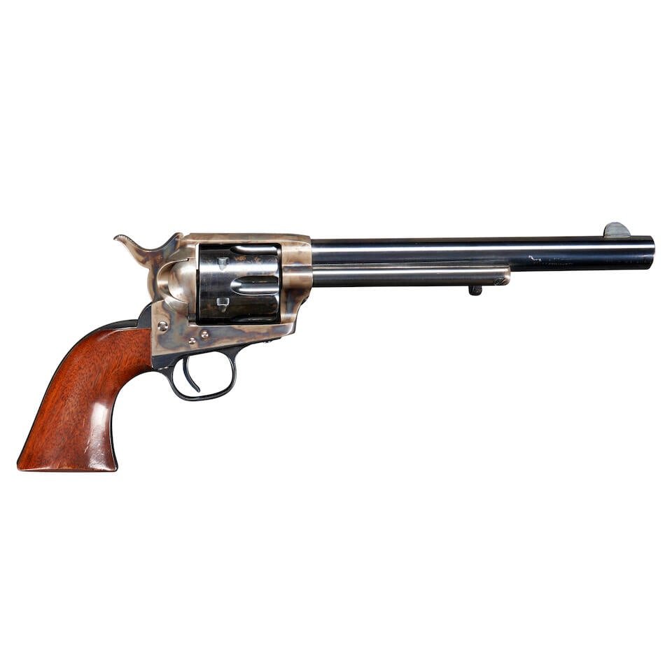 A COLT SINGLE ACTION ARMY REVOLVER,: A COLT SINGLE ACTION ARMY REVOLVER, 1878. Serial number 42520, .44 caliber blued barrel marked 'COLT'S PT.F.A.MFG. Co HARTFORD CT. U.S.A.' with ejector housing and bullseye headed rod below; blued cyl