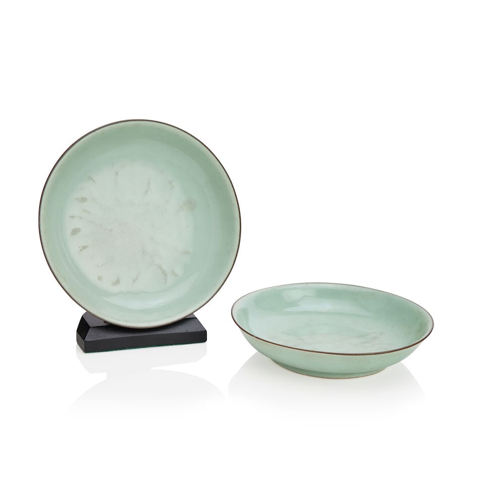 A pair of celadon saucer dishes with Jingwei tang zhi hall marks 18th/19th century