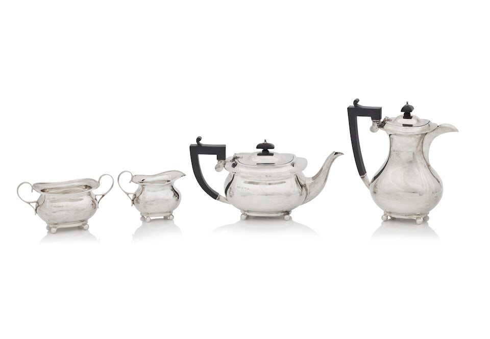 A George V silver four-piece silver tea set By Henry Matthews, Birmingham, 1927 (4) (1 of 1)