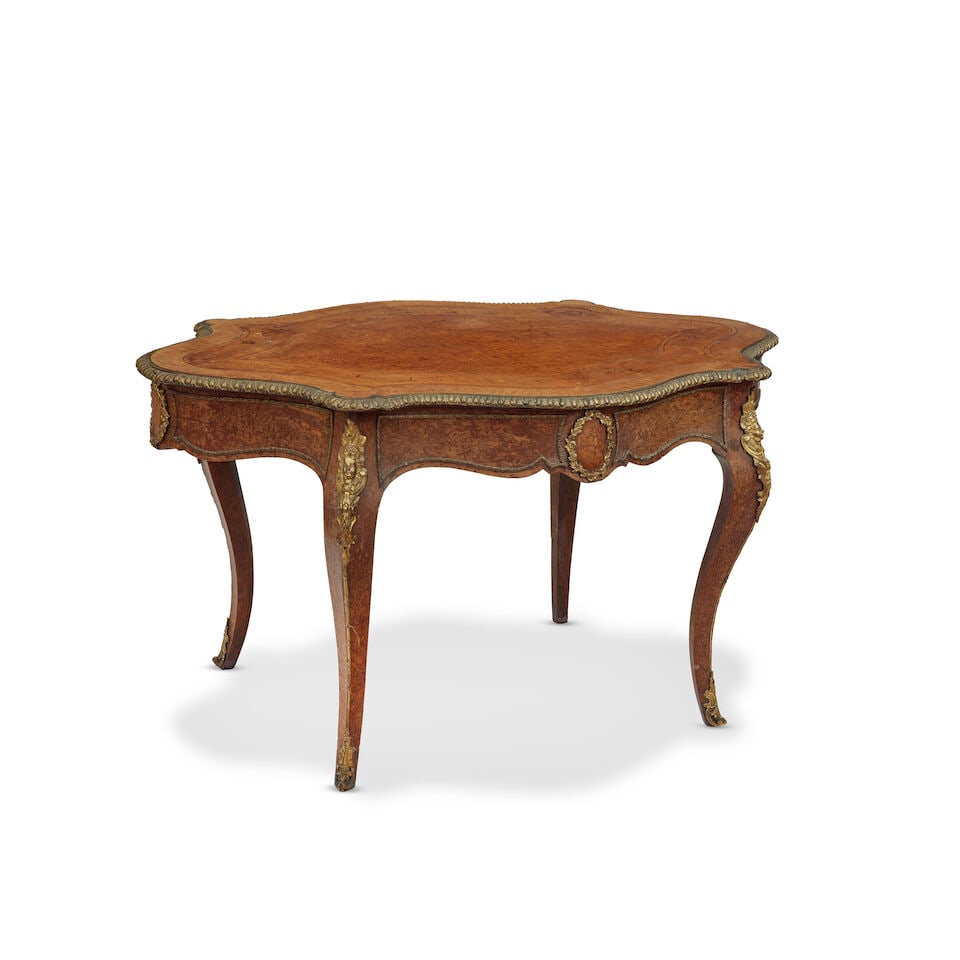 A mid 19th century burr walnut, pollard elm and rosewood marquetry inlaid gilt metal mounted cen... (1 of 1)