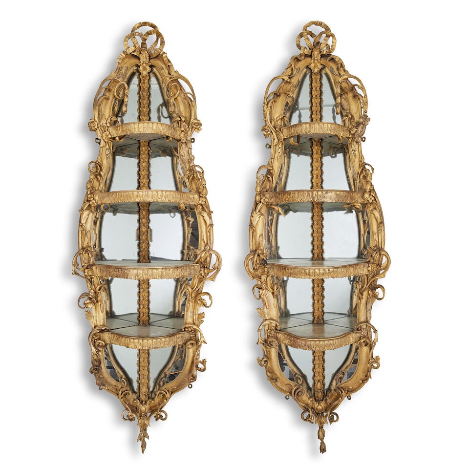 A pair of 19th century giltwood & gesso corner wall brackets By D Day Carver and Gilder Sloan S...: A pair of 19th century giltwood & gesso corner wall brackets By D Day Carver and Gilder Sloan Street Each with four graduated shelves with mirror backing within a moulded frame with applied flower fol