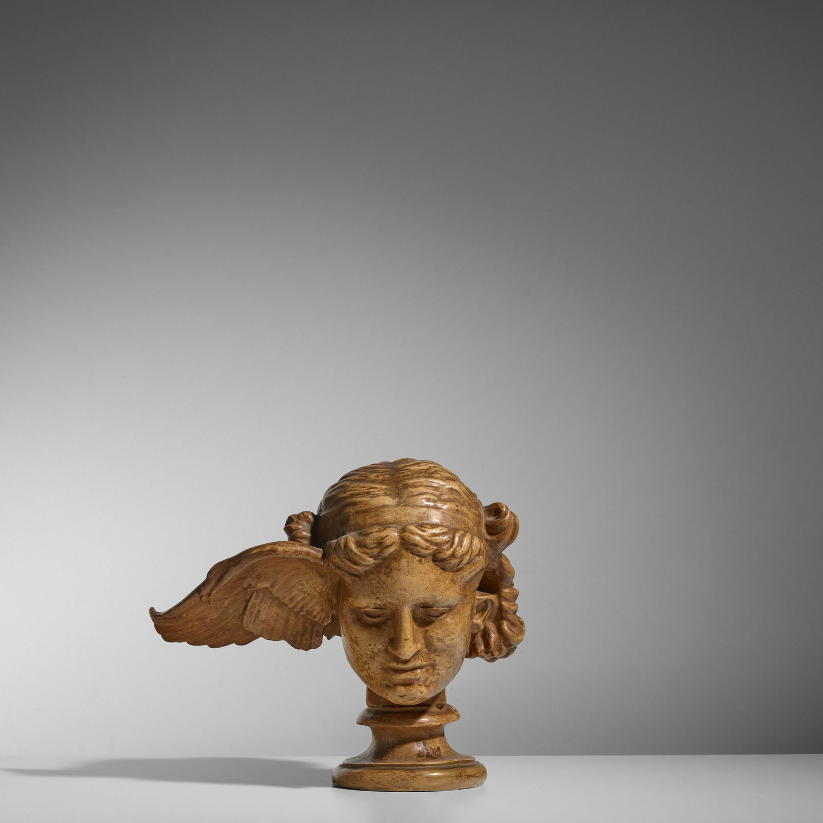 FERNAND KHNOPFF (1858-1921)  'Hypnos' Bustcirca 1910slip cast, glazed stoneware, stamped in the ... (1 of 3)