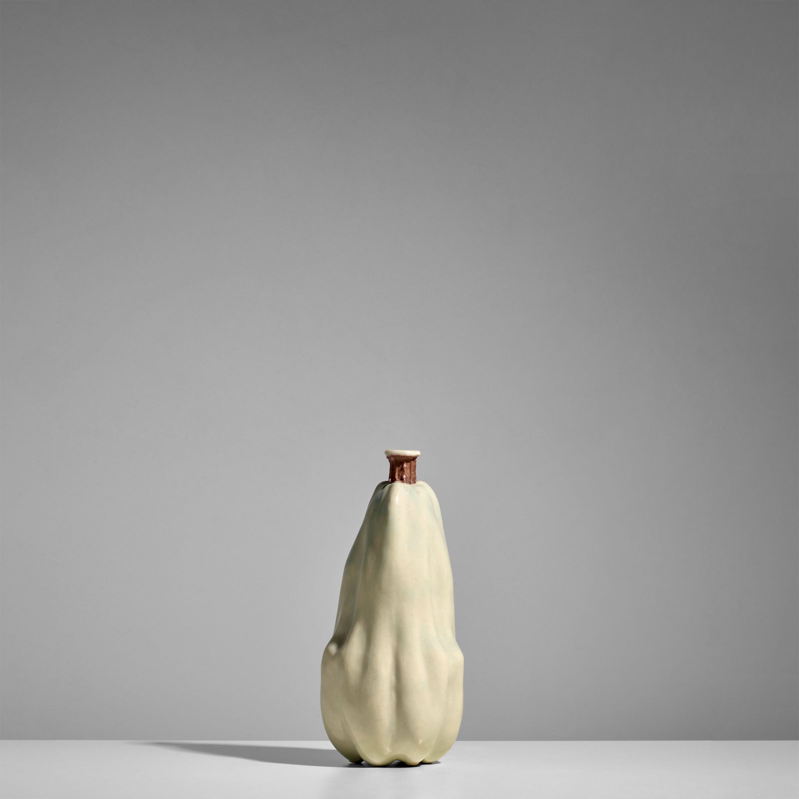 TAXILE DOAT (1851-1939) Gourd Vasecirca 1901 glazed porcelain, glaze mark 'DOAT' and seven pink ...: TAXILE DOAT (1851-1939) Gourd Vase circa 1901 glazed porcelain, glaze mark 'DOAT' and seven pink applied dots to base height 7 1/2in (19cm); diameter 3 1/4in (8cm)