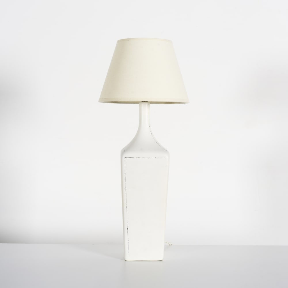 DENISE GATARD (1908-1991) Lampe de table: DENISE GATARD (1908-1991) Lampe de table Circa 1960 Monogrammée 'DG' Céramique émaillée Sans abat-jour : H: 34,5 cm. (13.1/2 in.); L: 11 cm. (4.1/4 in.); P: 11 cm. (4.1/4 in.) A mo