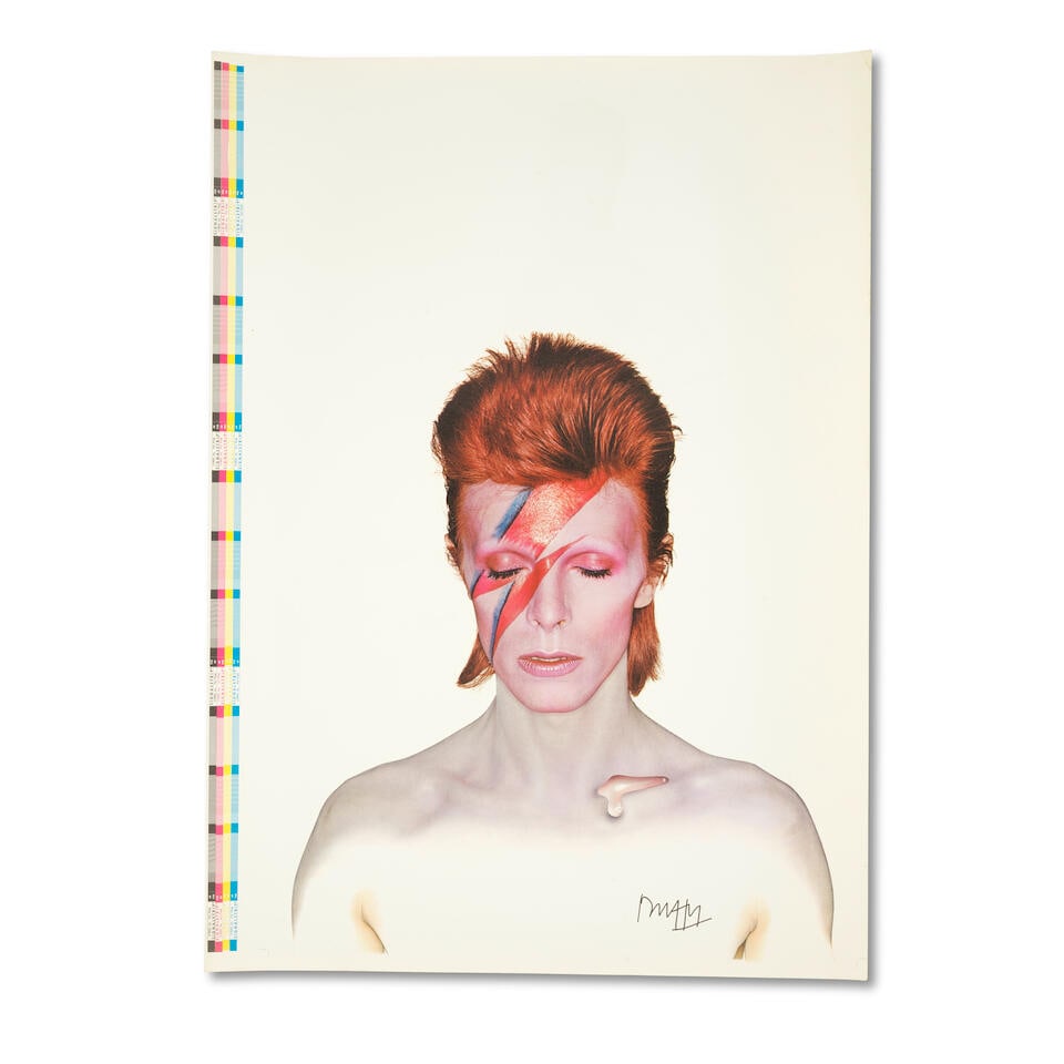 Brian Duffy (1933-2010): A Signed Double-sided printer's proof poster for Aladdin Sane together ...: Brian Duffy (1933-2010): A Signed Double-sided printer's proof poster for Aladdin Sane together with copy of the LP, 1973, front cover side finished in matte, signed by Duffy in black ink to the lower