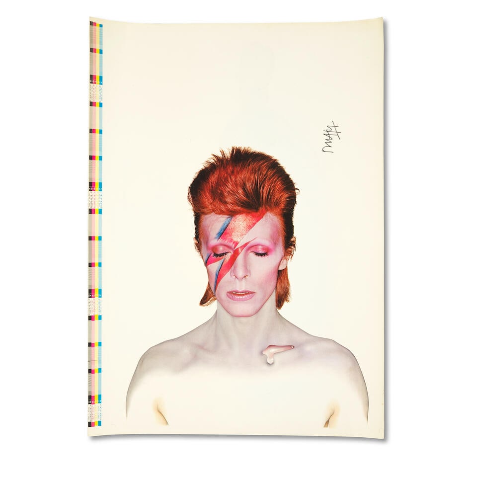 Brian Duffy (1933-2010): A Signed Double-sided printer's proof poster for Aladdin Sane, 1973,: Brian Duffy (1933-2010): A Signed Double-sided printer's proof poster for Aladdin Sane, 1973, both sides finished in gloss, front cover side signed above the head by Duffy in black ink, the reverse no